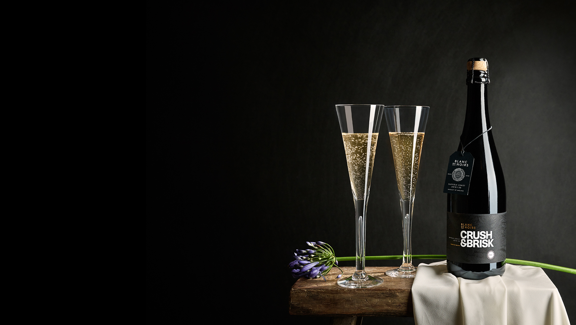 Wine bottle with two wine glasses